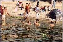 varanasi kids splashing in the ganges