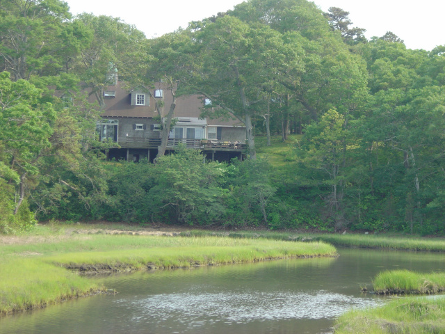 house over estuary